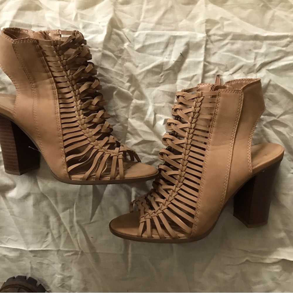 Cute stappy short boots or tall sanders.